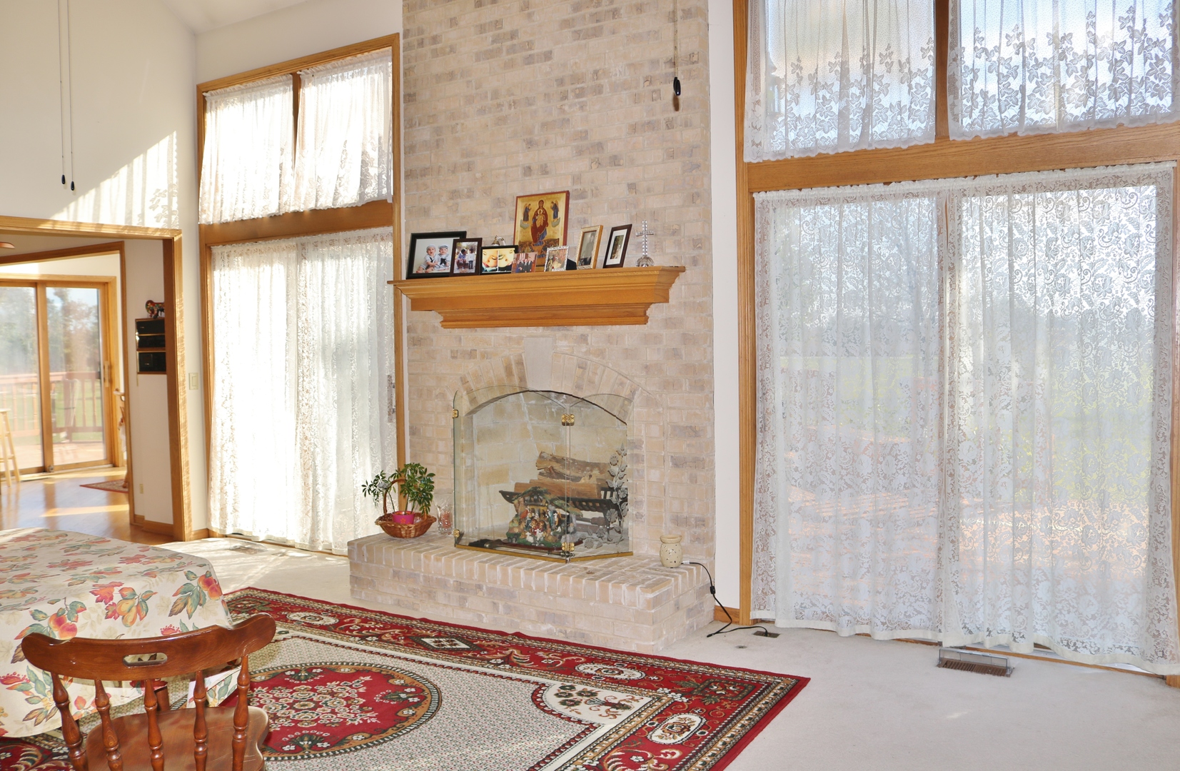 12232 Grove Road Minooka, IL 60447 - Photo 7 of 57 a living room with furniture and a window