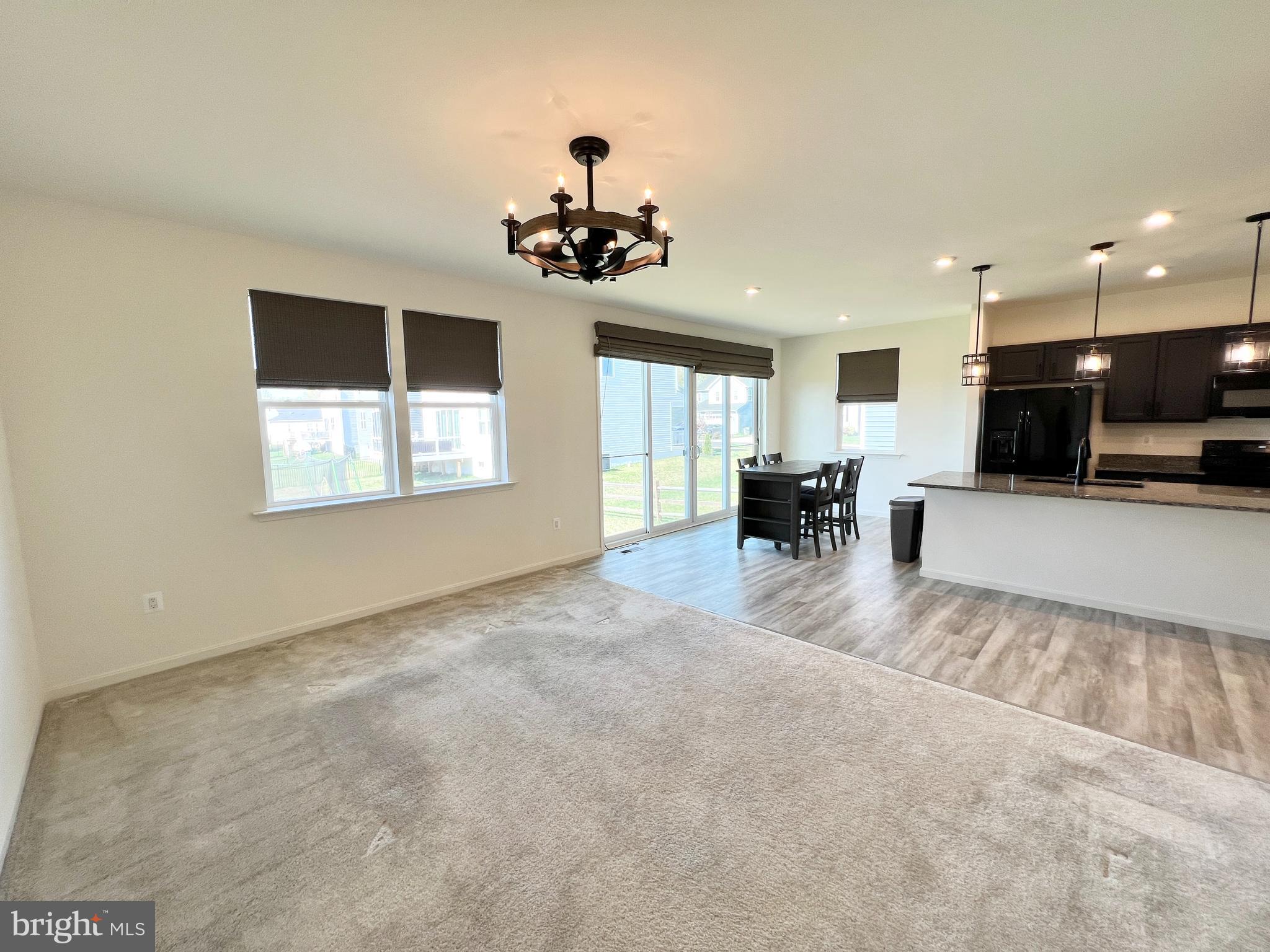 6366 Pointer Lane King George, VA 22485 - Photo 17 of 48 a view of a livingroom with furniture a ceiling fan and window