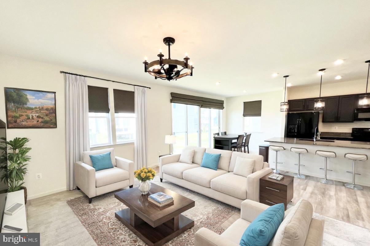 6366 Pointer Lane King George, VA 22485 - Photo 18 of 48 a living room with furniture and a flat screen tv