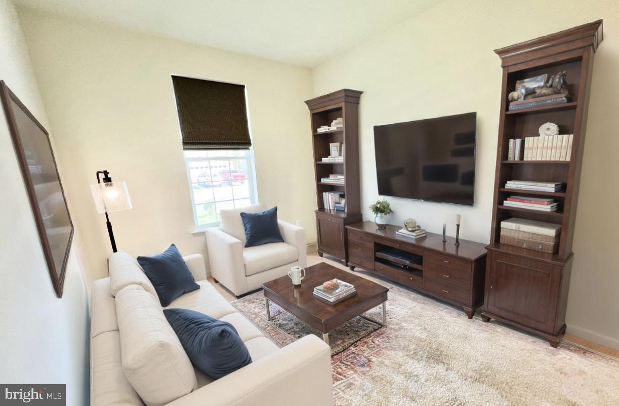 6366 Pointer Lane King George, VA 22485 - Photo 10 of 48 a living room with furniture and a flat screen tv