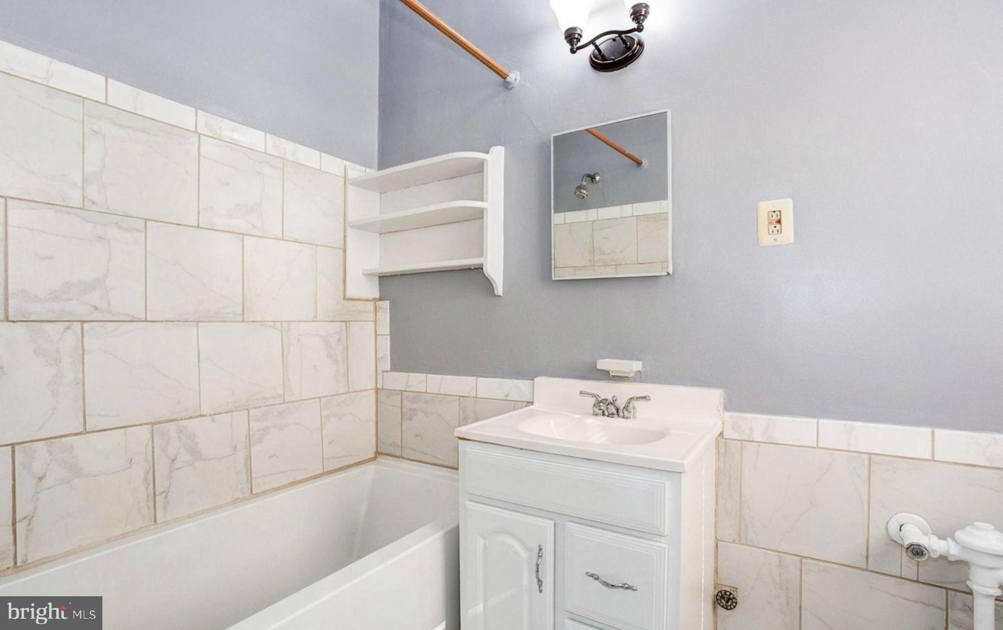 1954 Columbia Road Northwest, Unit 306 Washington, DC 20009 - Photo 10 of 21 newer tub and tile