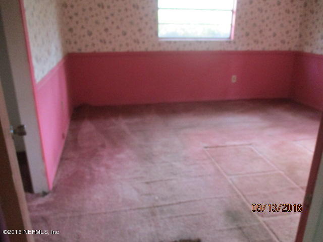 540841 Lem Turner Road Callahan, FL 32011 - Photo 10 of 15 a view of an empty room and a window