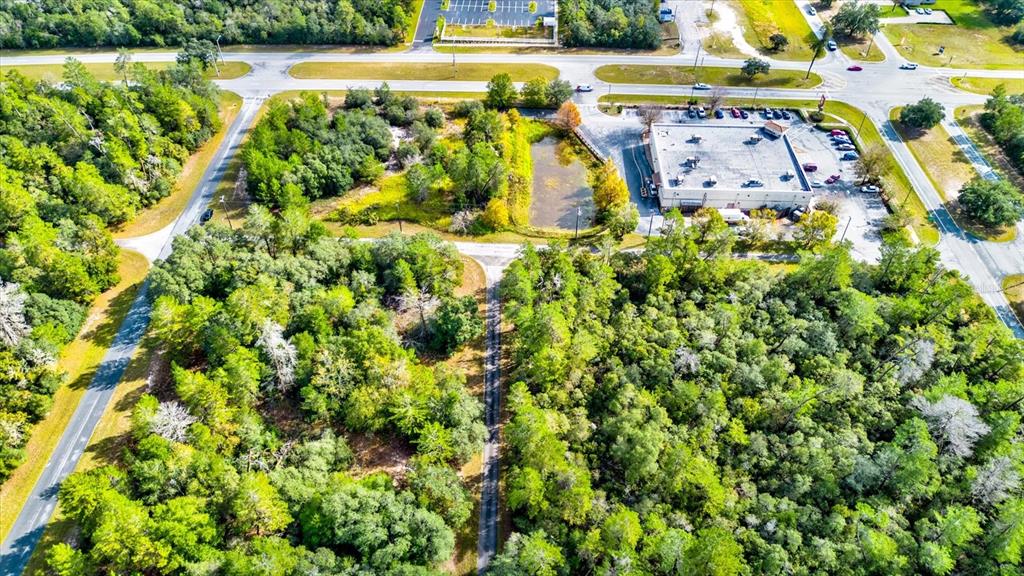 0 Southwest 148th Place Road Ocala, FL 34473 - Photo 28 of 55 a view of a swimming pool with a yard