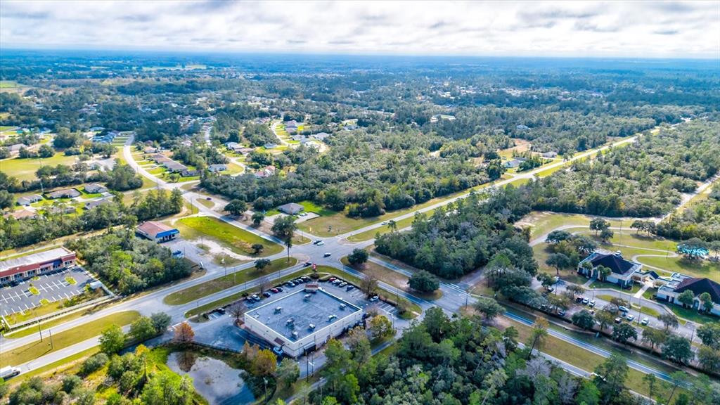0 Southwest 148th Place Road Ocala, FL 34473 - Photo 34 of 55 an aerial view of a city