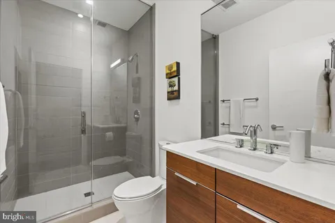 a bedroom with furniture and a bed