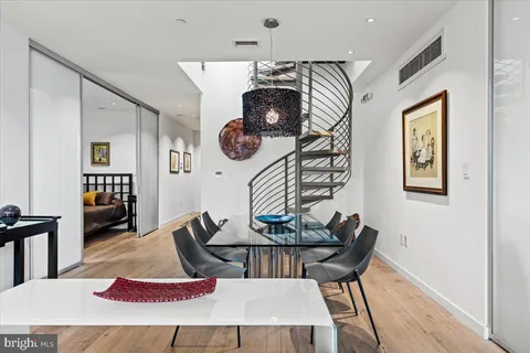 a view of a dining room with furniture