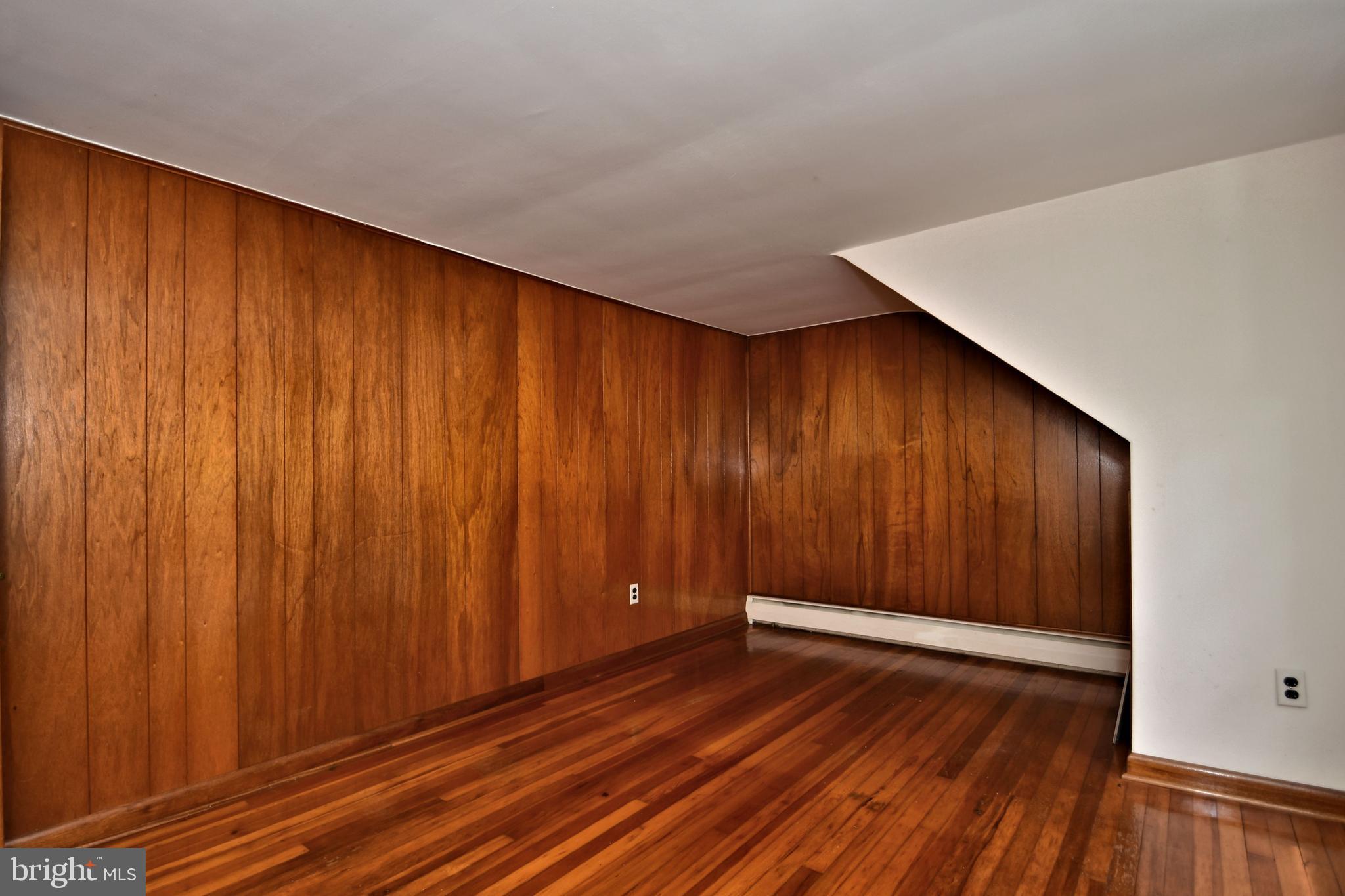 70 Old State Road Devon, PA 19333 - Photo 14 of 20 a view of an empty room with wooden floor