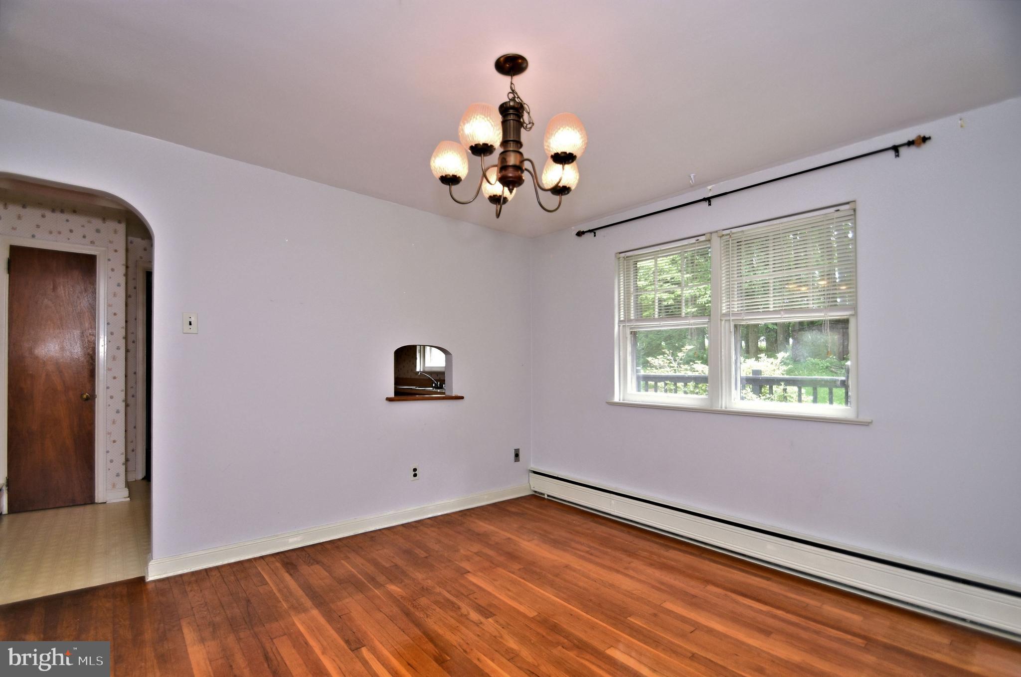 70 Old State Road Devon, PA 19333 - Photo 4 of 20 a view of an empty room with a window
