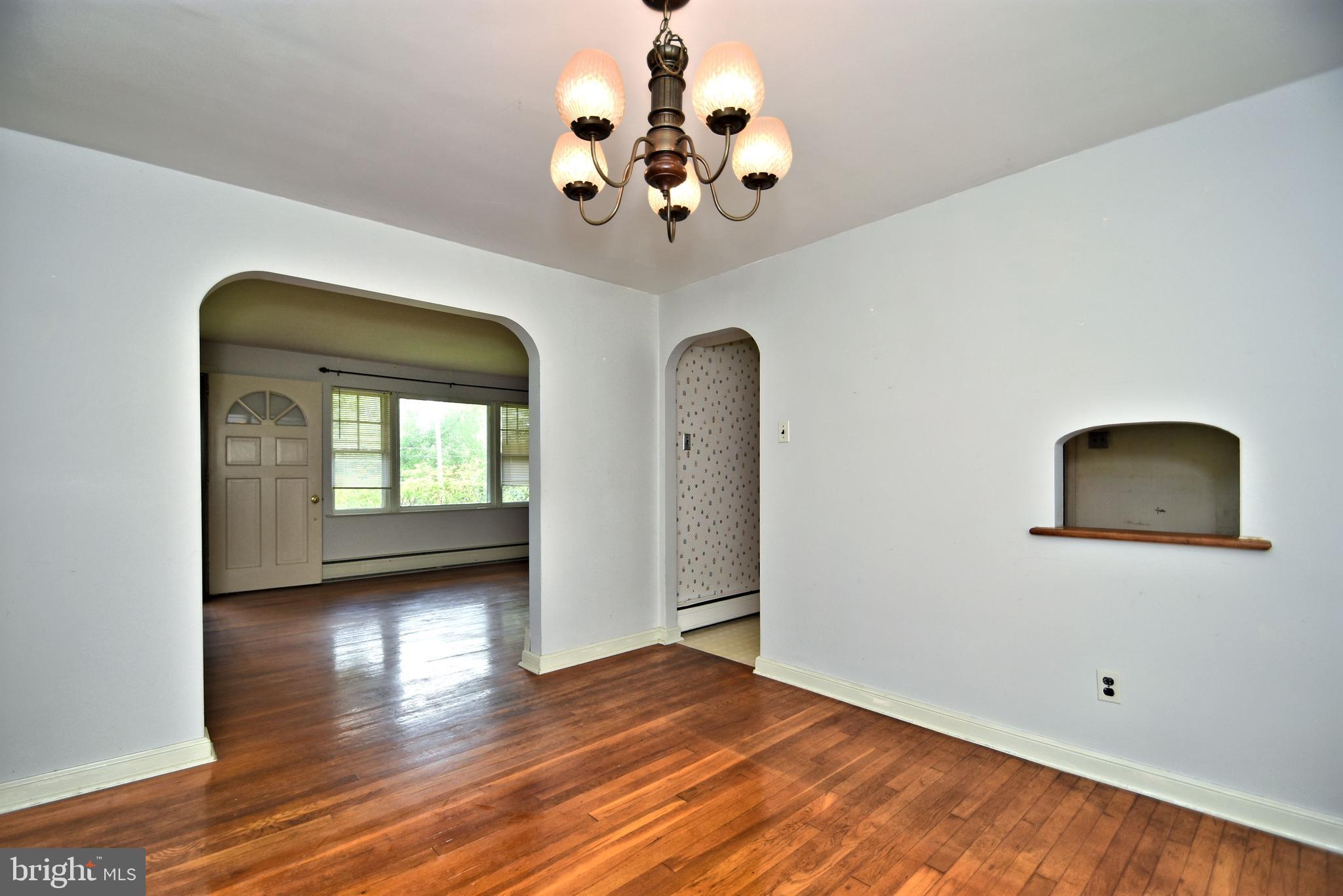 70 Old State Road Devon, PA 19333 - Photo 5 of 20 a view of livingroom with hardwood floor and a ceiling fan