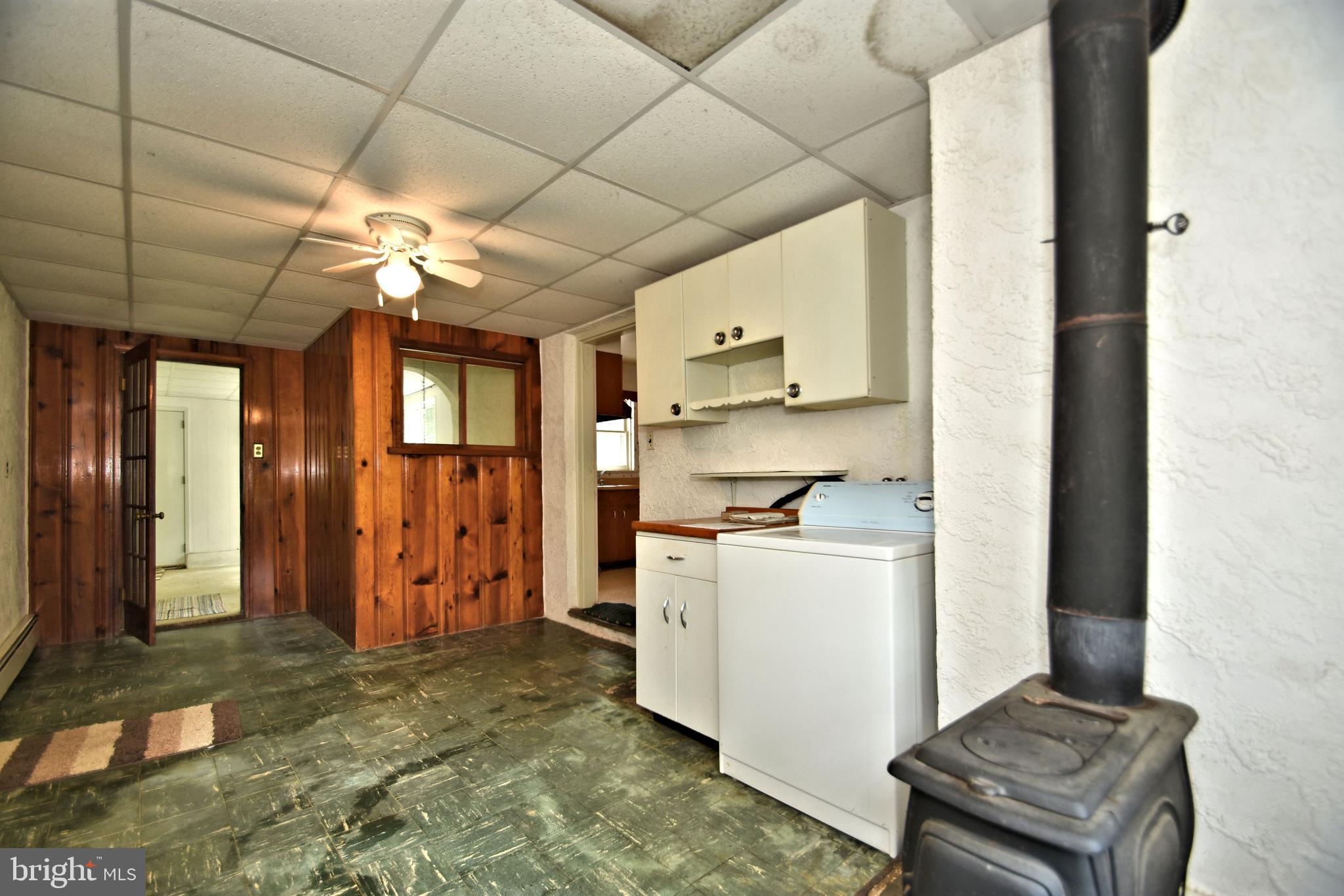 70 Old State Road Devon, PA 19333 - Photo 7 of 20 a kitchen with stainless steel appliances granite countertop a refrigerator a stove and a sink