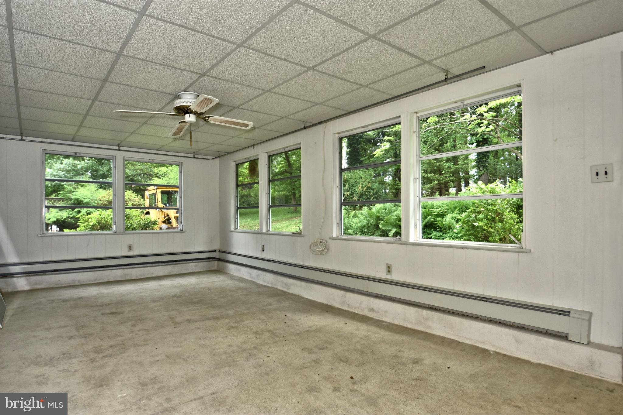 70 Old State Road Devon, PA 19333 - Photo 8 of 20 a view of an empty room with a window