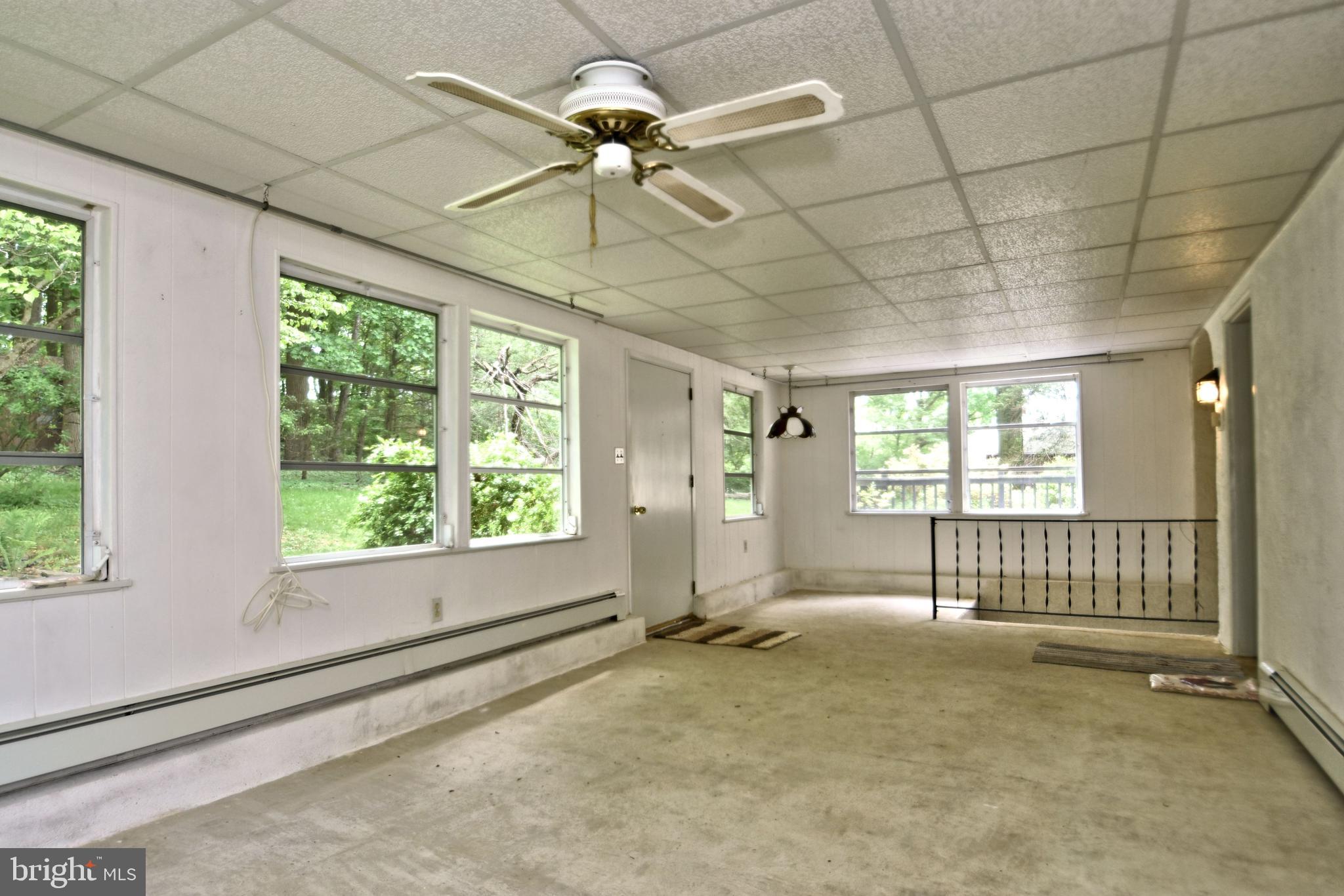 70 Old State Road Devon, PA 19333 - Photo 9 of 20 a view of an empty room with a window