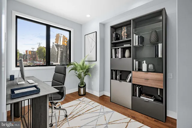 a bedroom with furniture and a window