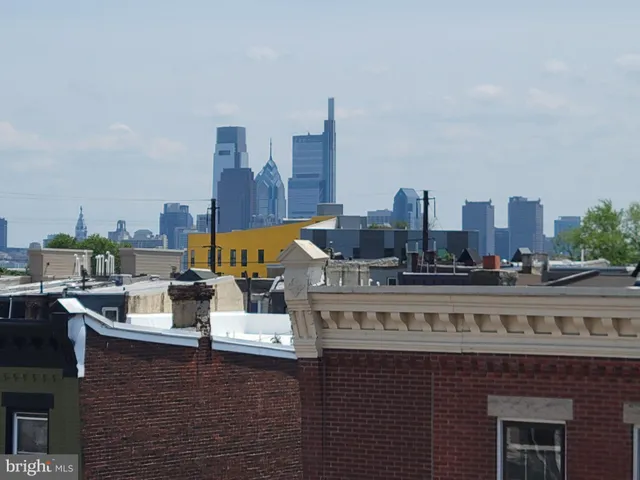 a view of a city with tall buildings