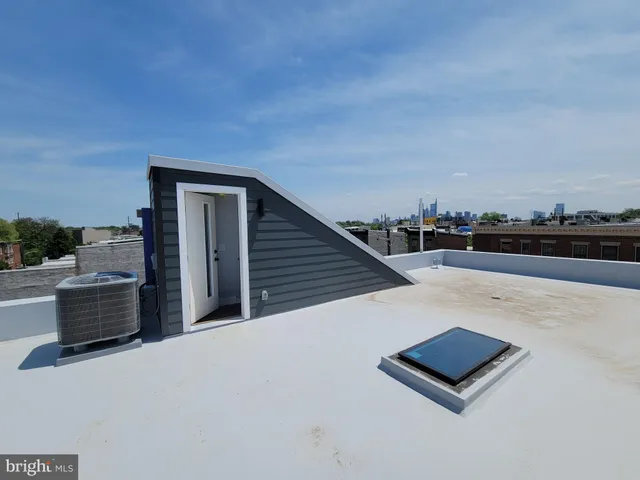 a view of balcony with furniture