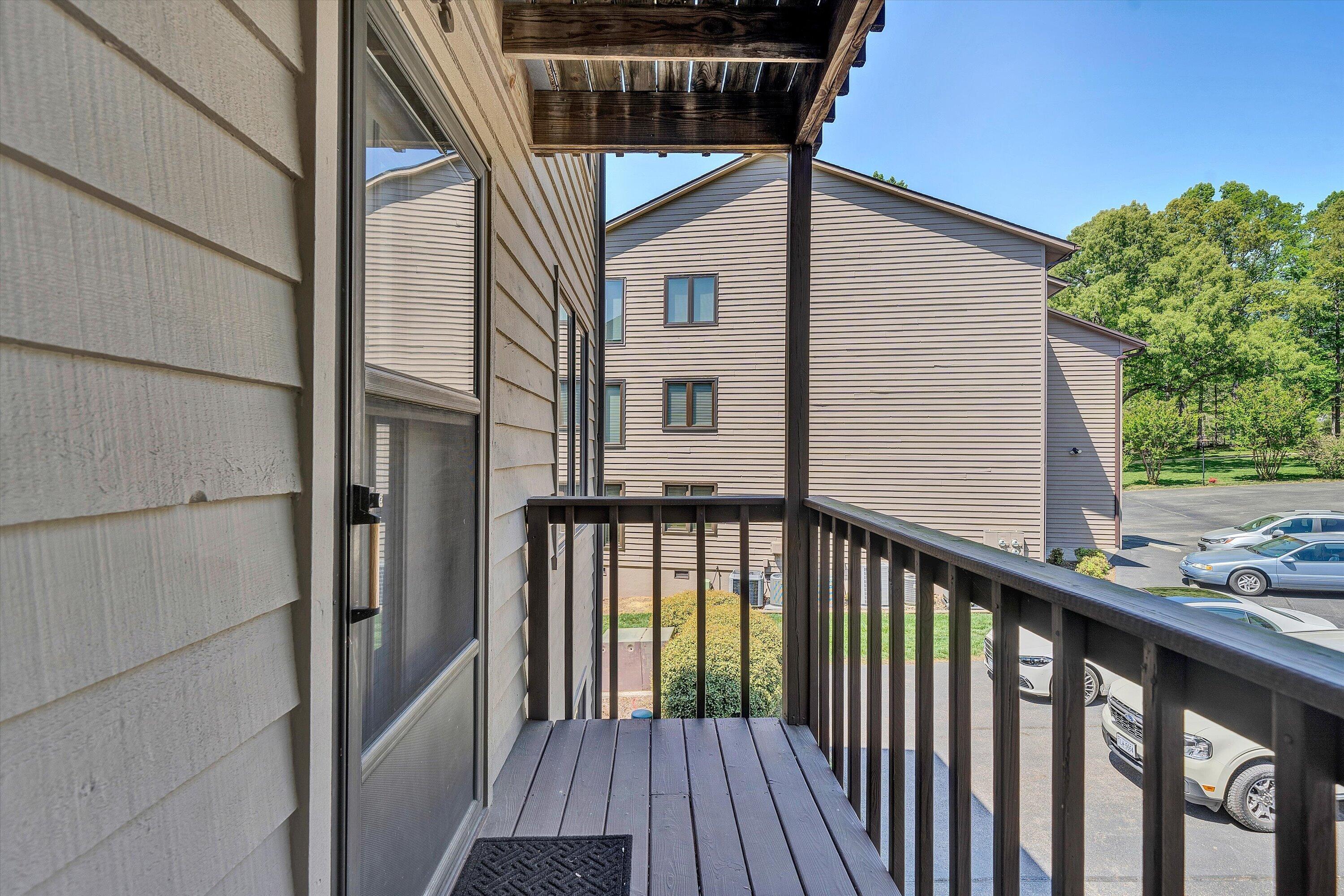 620 Monte Vista Road, Unit 605 Union Hall, VA 24176 - Photo 5 of 41 a view of a balcony with wooden floor