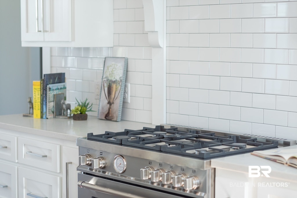 389 Pecan Avenue Fairhope, AL 36532 - Photo 15 of 50 Outstanding gas cooking on this Italian Range