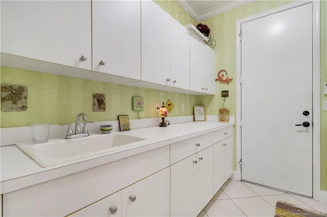 a view of a chair and tables on the deck