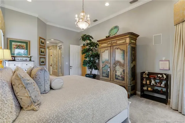 a en suite bathroom with a double vanity sink and mirror