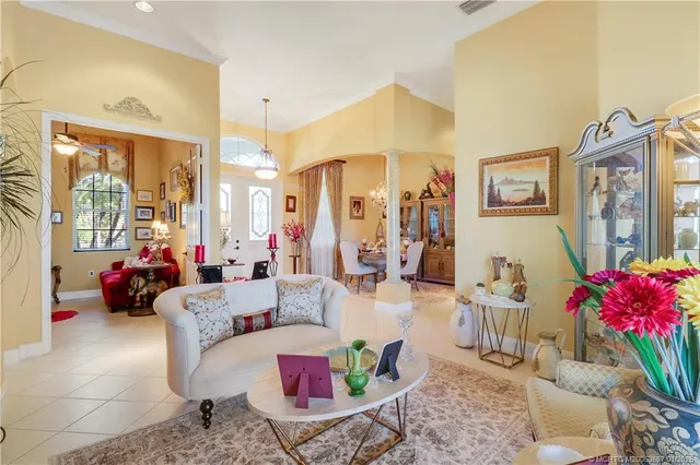 a kitchen with stainless steel appliances kitchen island granite countertop a stove and cabinets