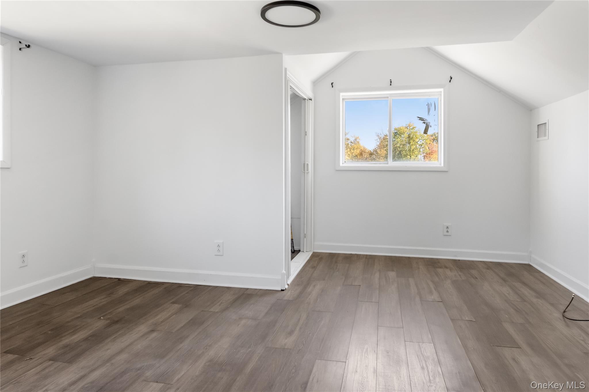 13 Strack Road Goshen, NY 10924 - Photo 16 of 22 a view of room with wooden floor and window