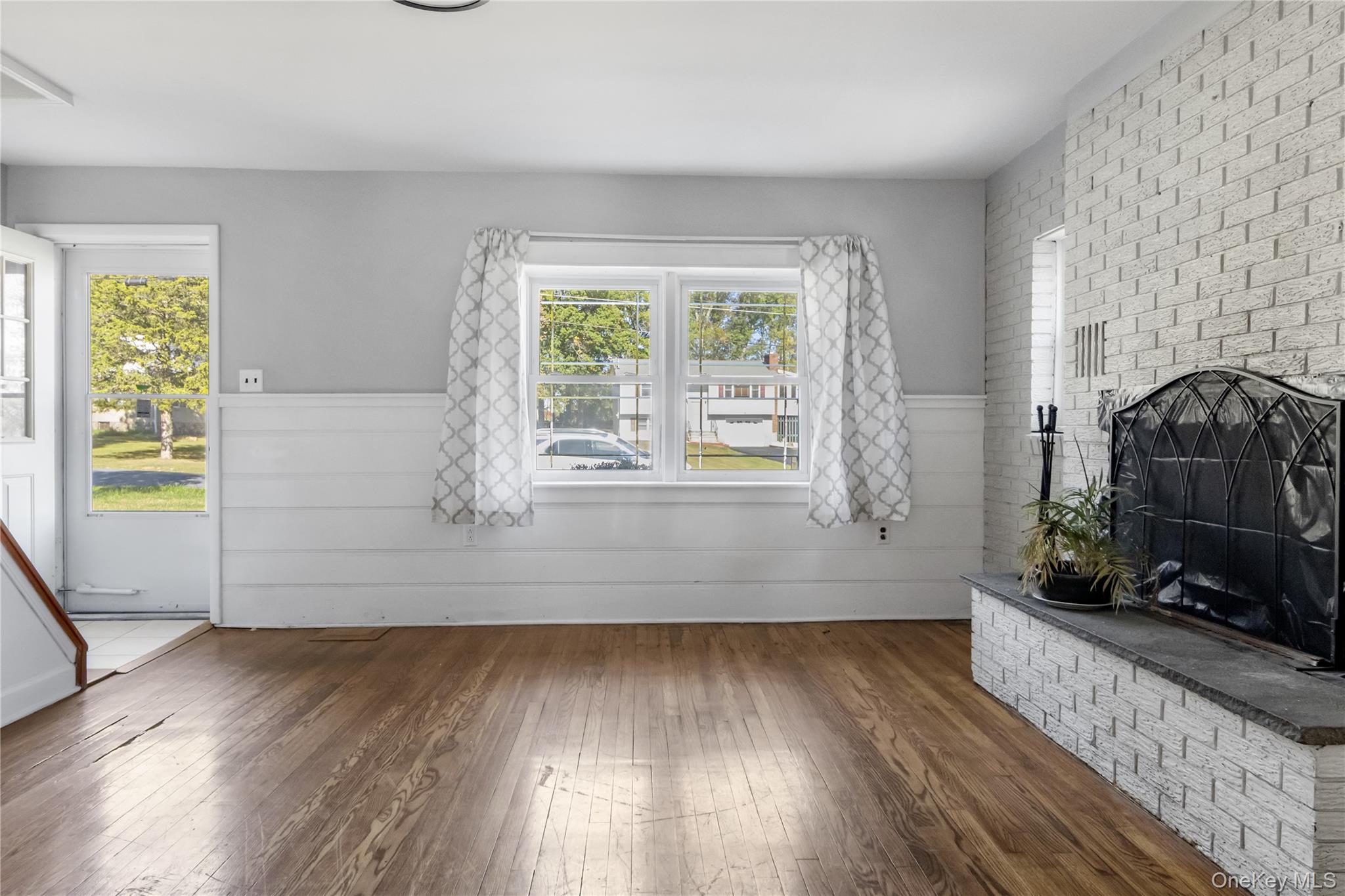 13 Strack Road Goshen, NY 10924 - Photo 4 of 22 a view of empty room with wooden floor and fan