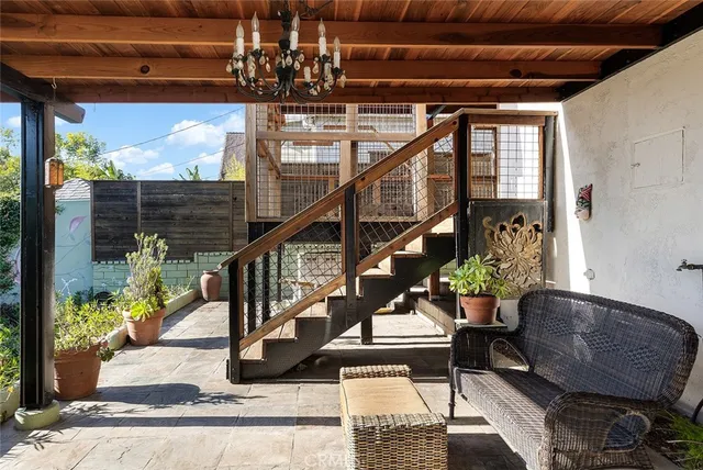 a view of a balcony with wooden floor