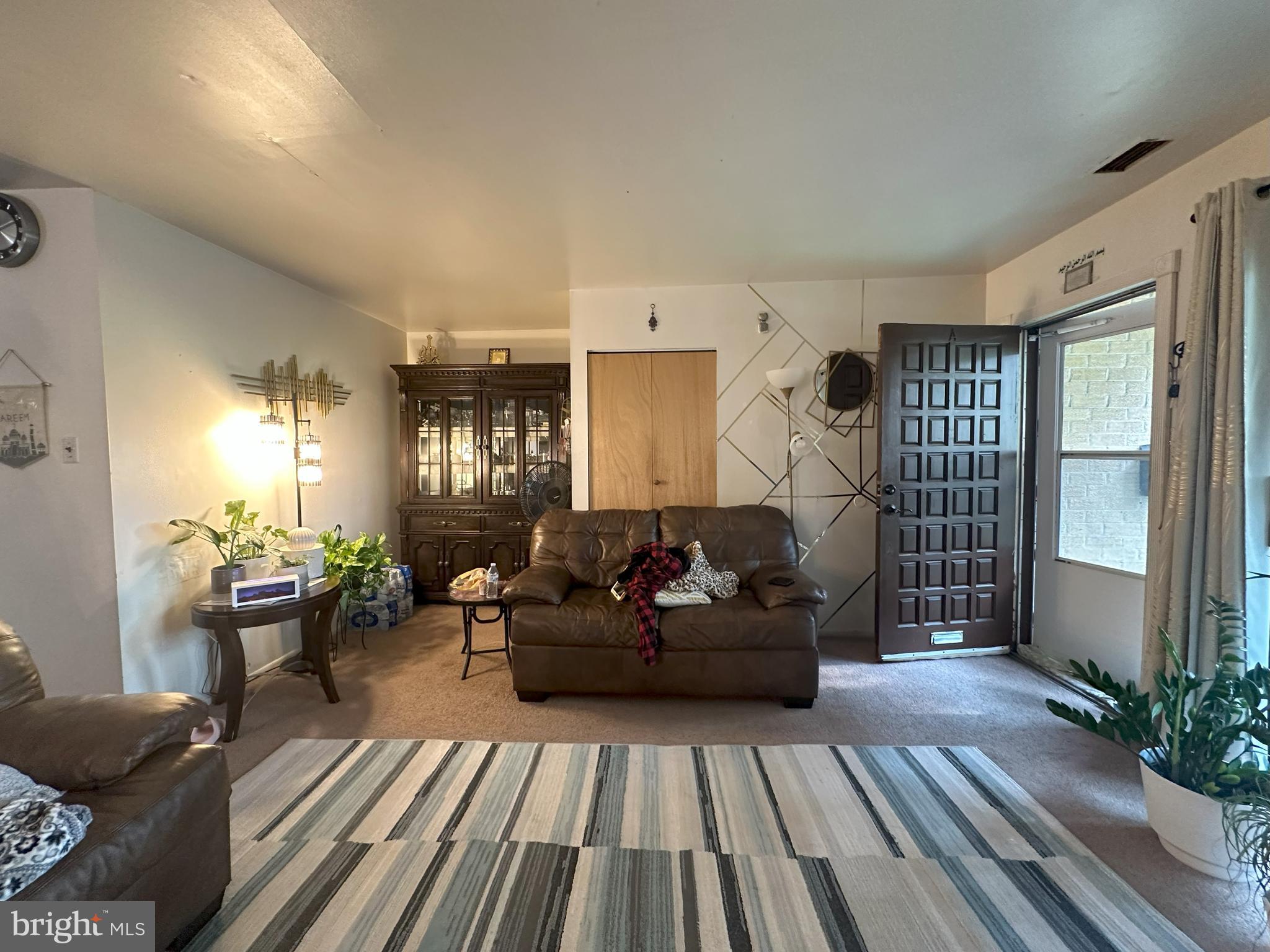 7525 Calvert Street Philadelphia, PA 19152 - Photo 21 of 38 a living room with furniture and wooden floor