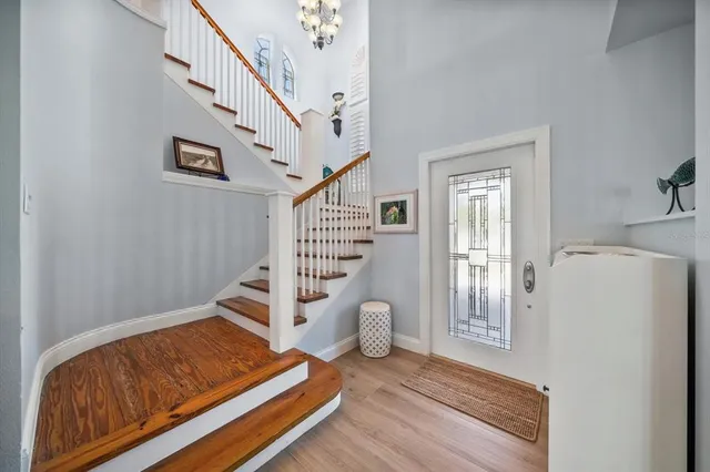 a kitchen with stainless steel appliances granite countertop a sink dishwasher stove top oven and refrigerator