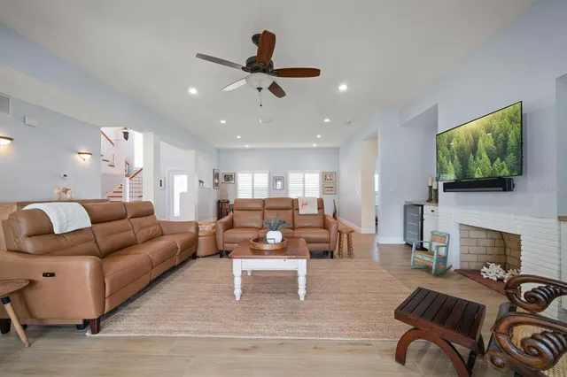 a bedroom with two beds and windows