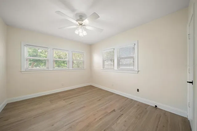 a view of a lake with a yard