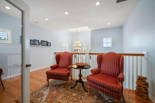 a view of backyard with seating and green space