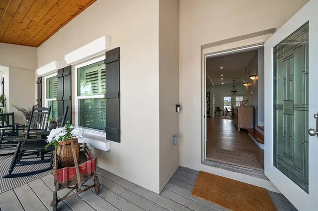 a living room with fireplace furniture and a flat screen tv