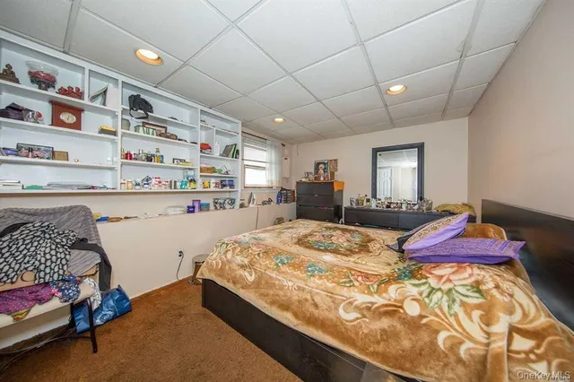 a bed room with a bed and a couch