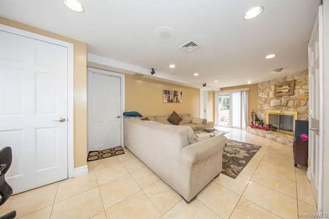 a living room with furniture and a table