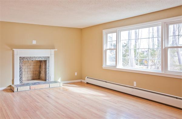 140 Druid Hill Road Springfield, MA 01129 - Photo 11 of 23 an empty room with wooden floor and windows