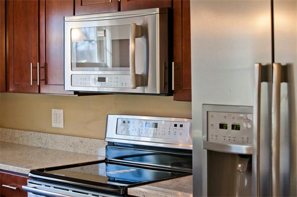 140 Druid Hill Road Springfield, MA 01129 - Photo 5 of 23 a kitchen with a stove and a microwave