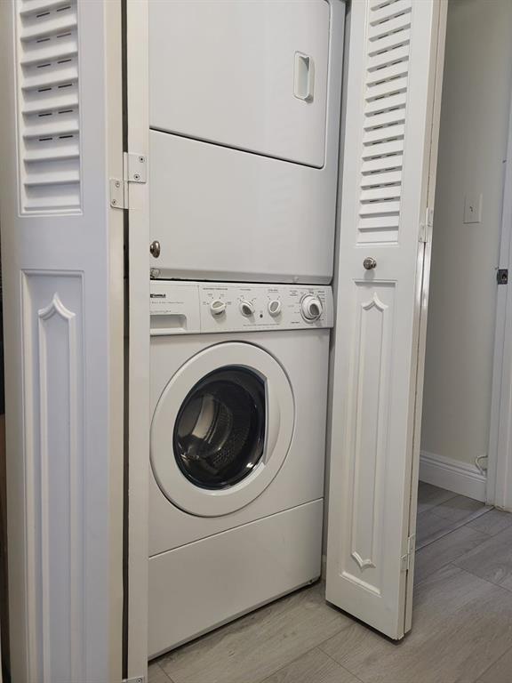 8305 Northwest 61st Street, Unit C110 Tamarac, FL 33321 - Photo 10 of 15 a utility room with dryer and washer