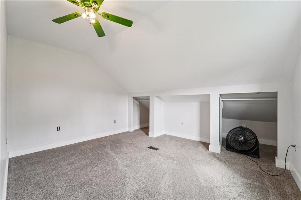 6012 Cunningham Road Gibsonia, PA 15044 - Photo 14 of 26 a view of an empty room with a fan