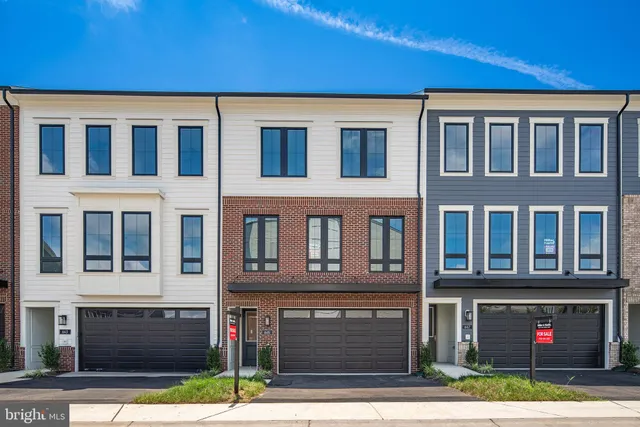 a front view of a building with a street