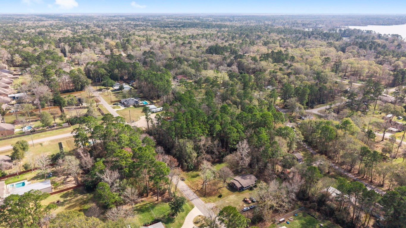 0 Magnolia Point Drive Huffman, TX 77336 - Photo 11 of 17 an aerial view of a houses with a yard and mountain view in back