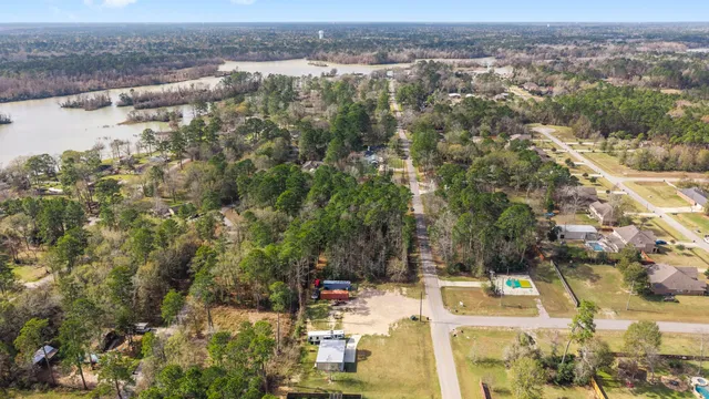 an aerial view of houses with yard