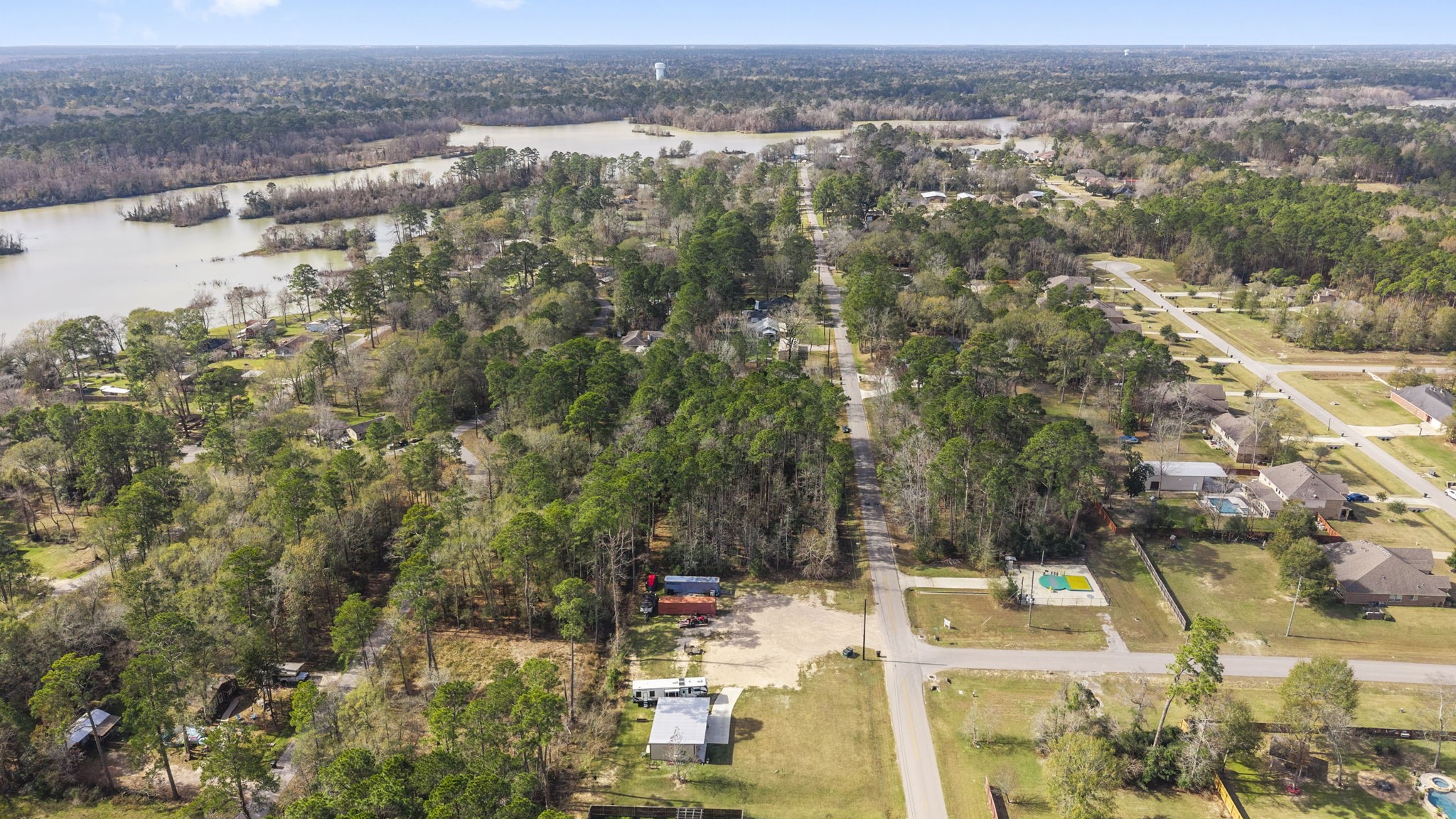 344 Magnolia Point Drive Huffman, TX 77336 - Photo 5 of 17 an aerial view of houses with yard