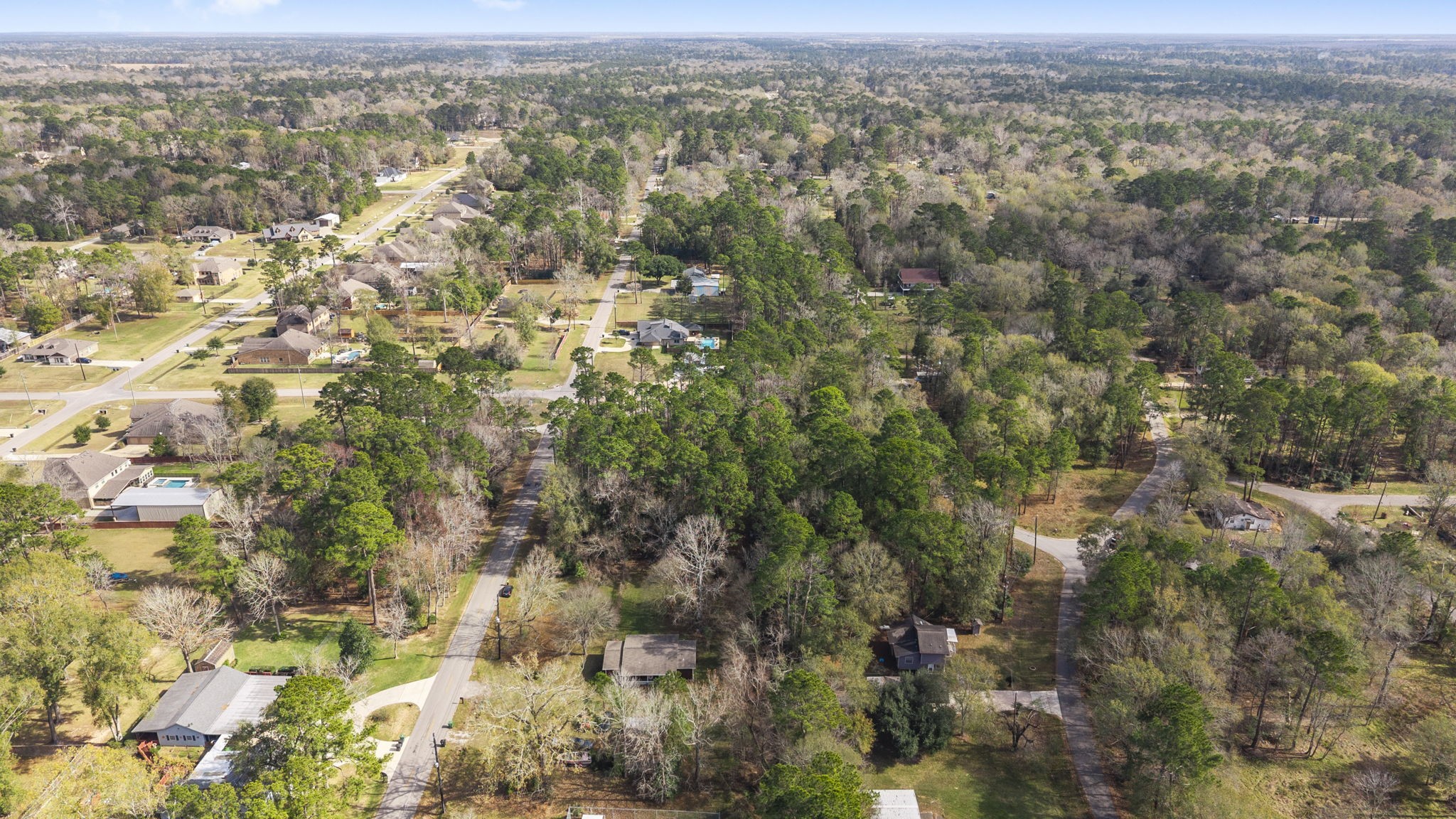 344 Magnolia Point Drive Huffman, TX 77336 - Photo 10 of 17 an aerial view of residential houses with outdoor space