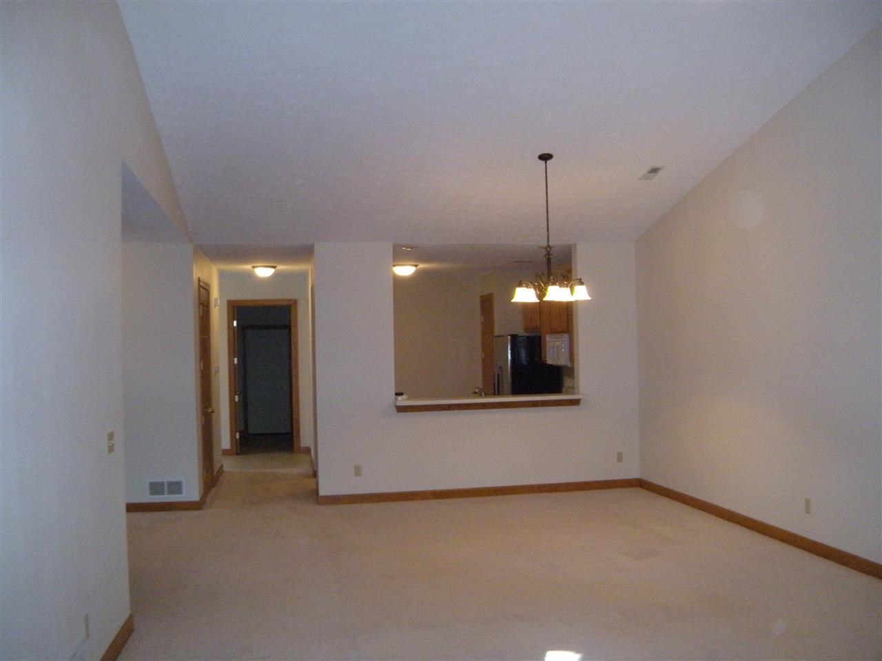 10337 Marblewing Road Roscoe, IL 61073 - Photo 11 of 14 a view of a room with a fireplace and window