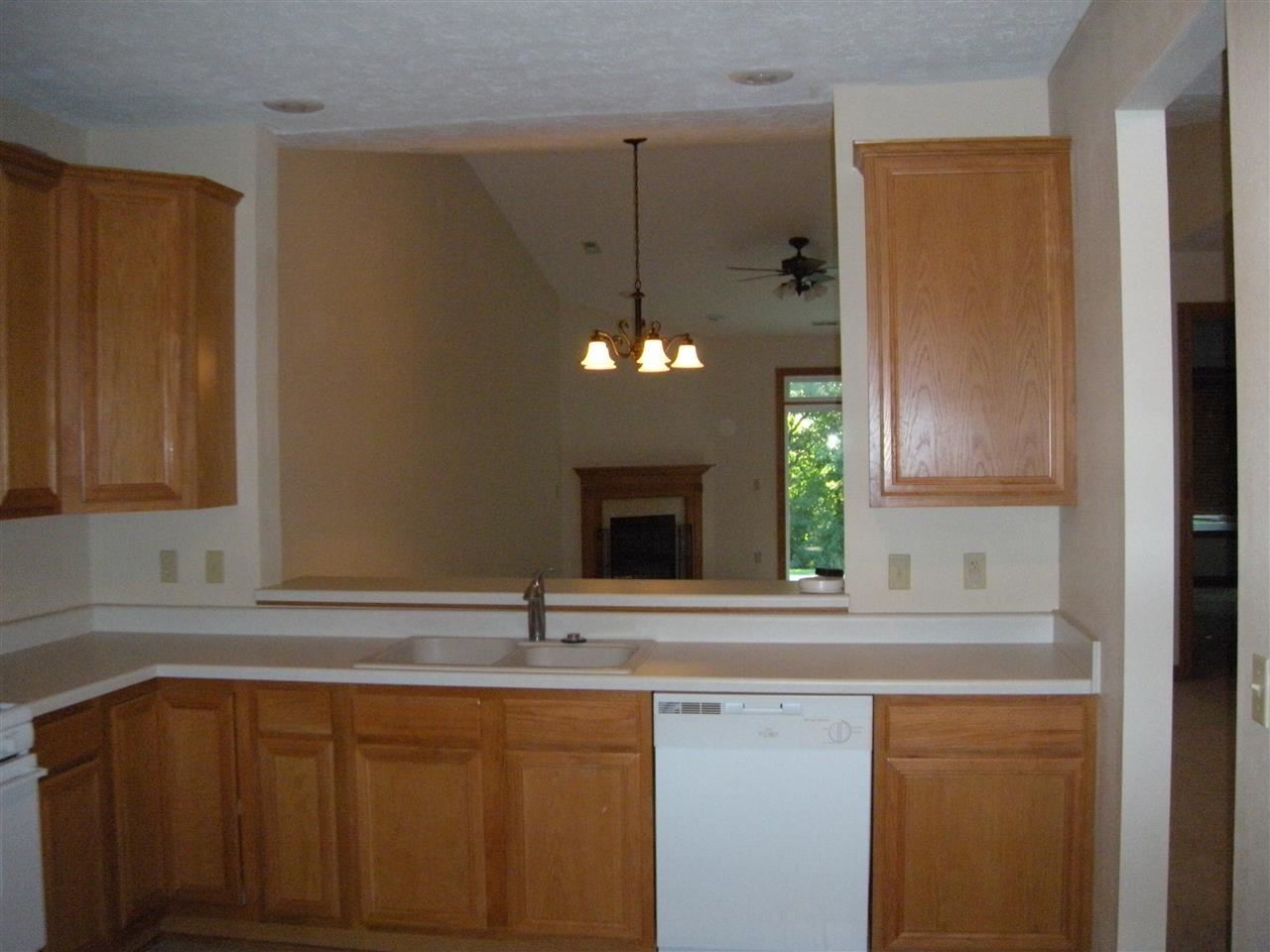 10337 Marblewing Road Roscoe, IL 61073 - Photo 13 of 14 a bathroom with a sink and a mirror