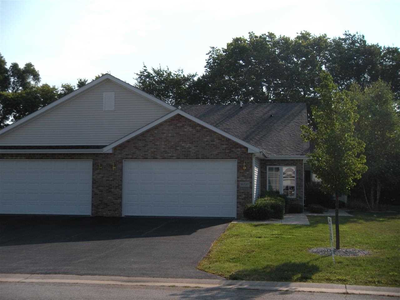 10337 Marblewing Road Roscoe, IL 61073 - Photo 2 of 14 a view of a house with a yard