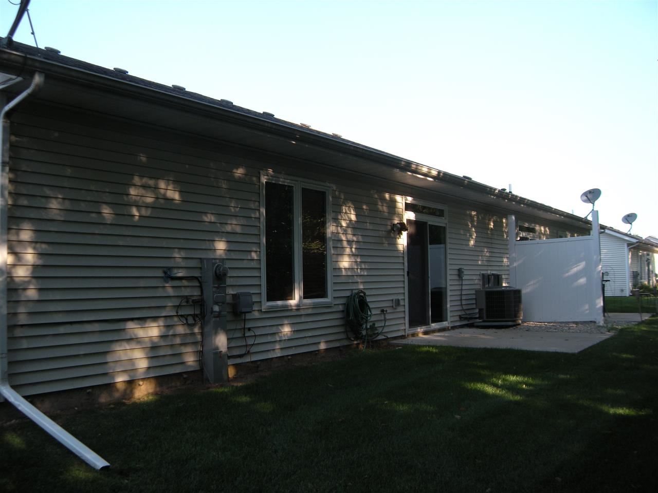 10337 Marblewing Road Roscoe, IL 61073 - Photo 4 of 14 a front view of a house with a yard