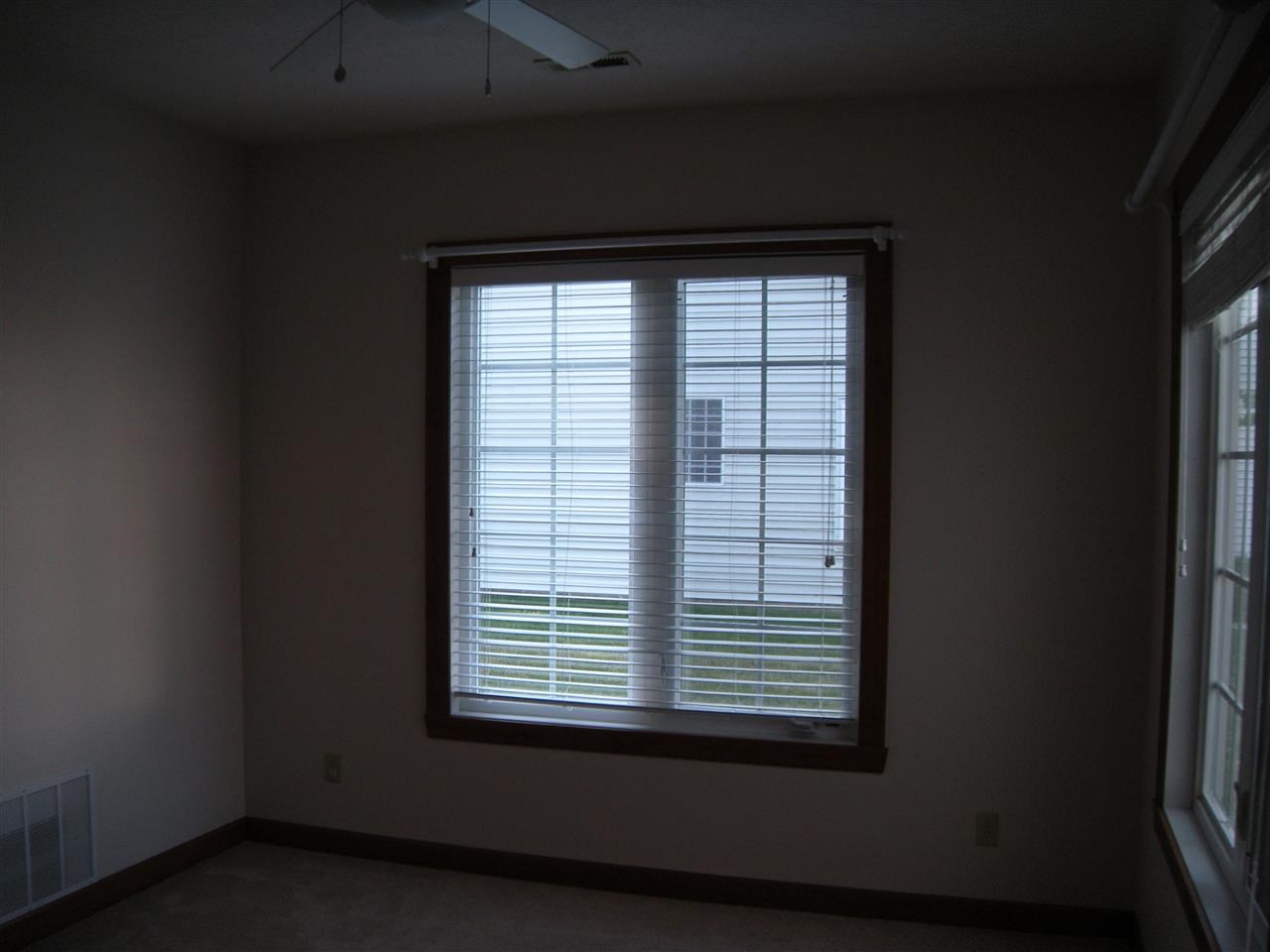 10337 Marblewing Road Roscoe, IL 61073 - Photo 6 of 14 a view of a room that has a window in it