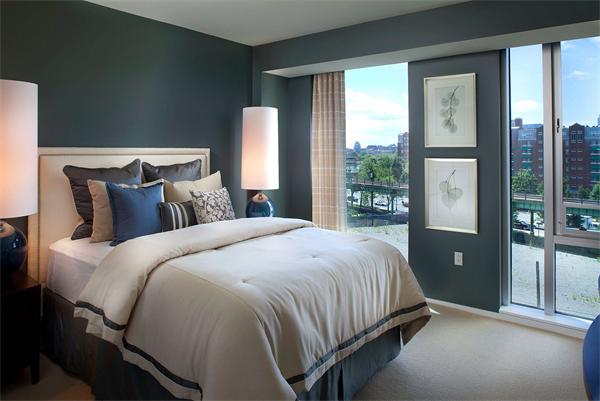 2 Earhart Street, Unit 204 Cambridge, MA 02141 - Photo 3 of 11 a bedroom with a large bed and a window